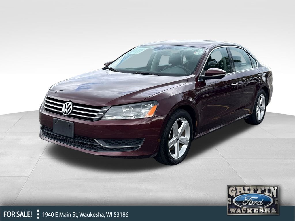 Opera Red Metallic 2012 Volkswagen Passat Sedan Front-Wheel Drive 5-Speed Manual