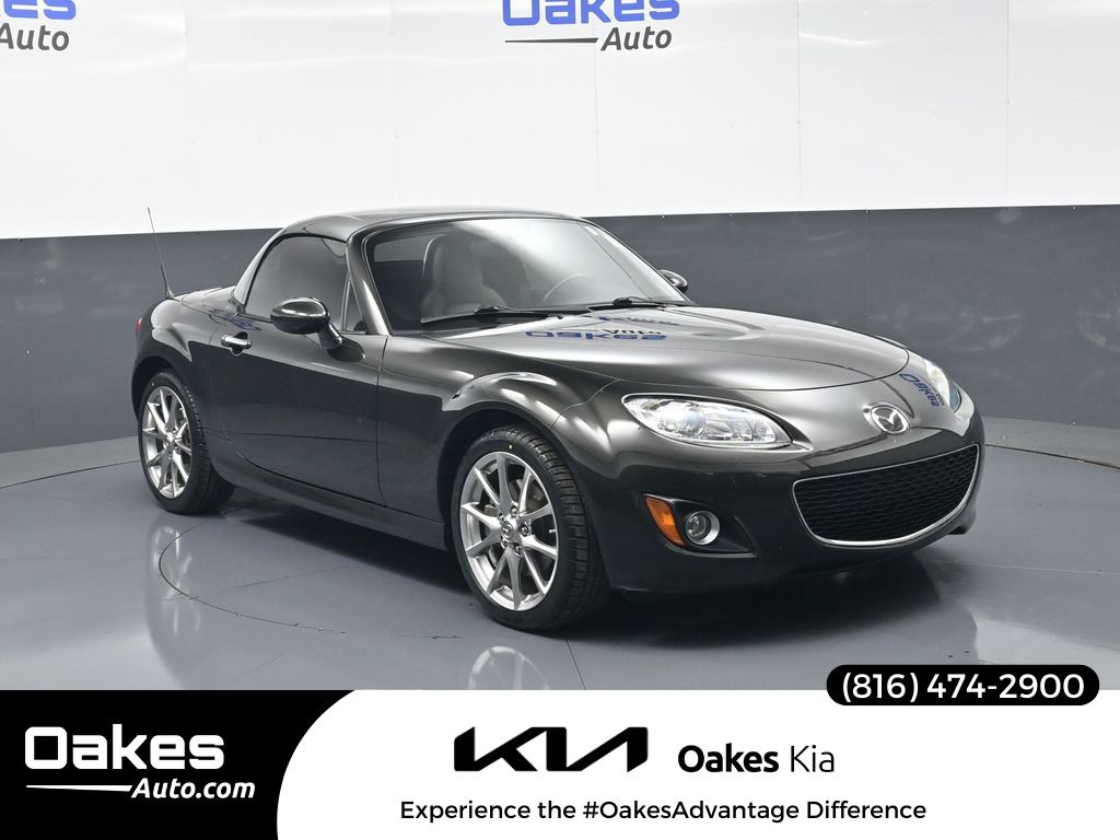 Sparkling Black Mica 2011 Mazda MX-5 Miata Grand Touring with Retractable Hardtop Convertible Rear-Wheel Drive 6-Speed Automatic
