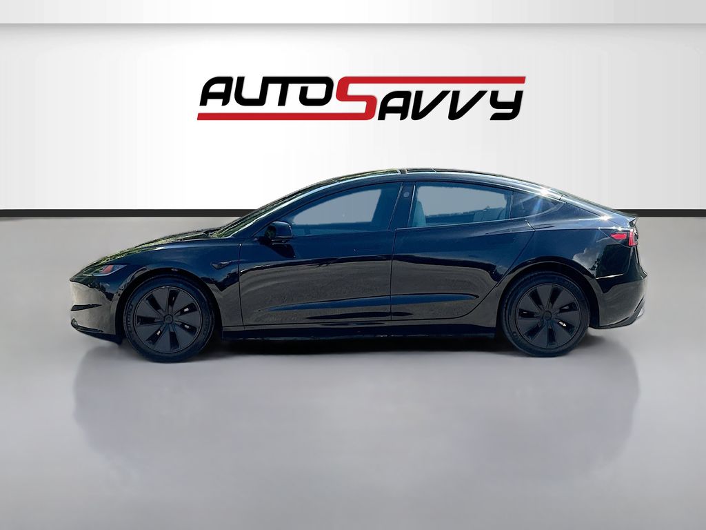 2025 Tesla Model 3 Long Range Black at AutoSavvy Houston Northwest
