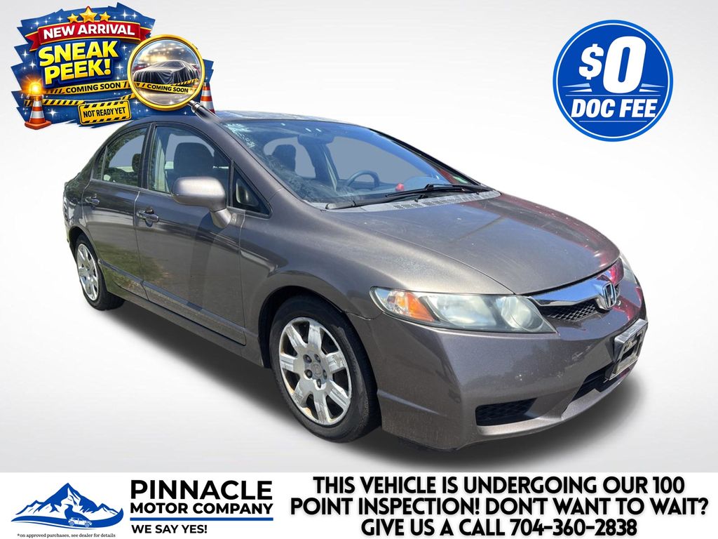 Urban Titanium Metallic 2010 Honda Civic LX Sedan Front-Wheel Drive 5-Speed Automatic