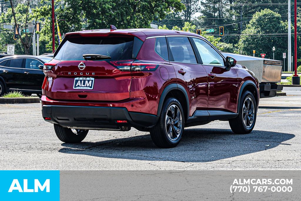 Used 2025 Red Nissan SV / MT Certified image 6