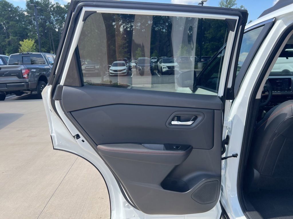 2025 Everest White Pearl Nissan Rogue Rock Creek AWD SUV