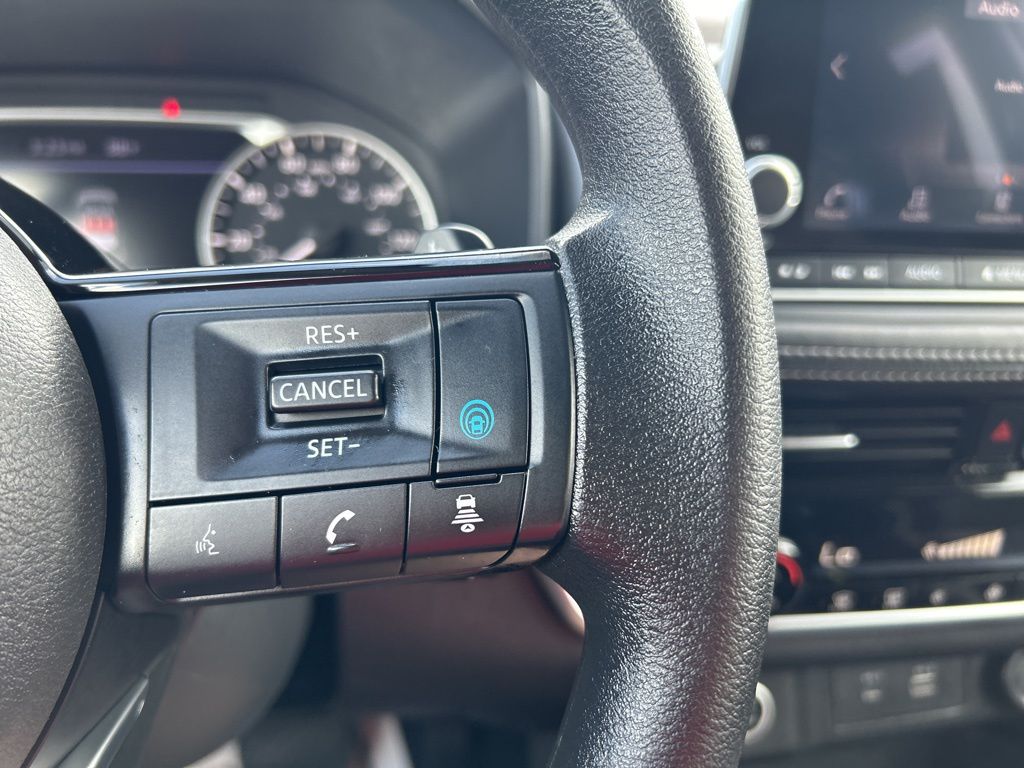 2023 Pearl White Tricoat Nissan Rogue SV FWD SUV