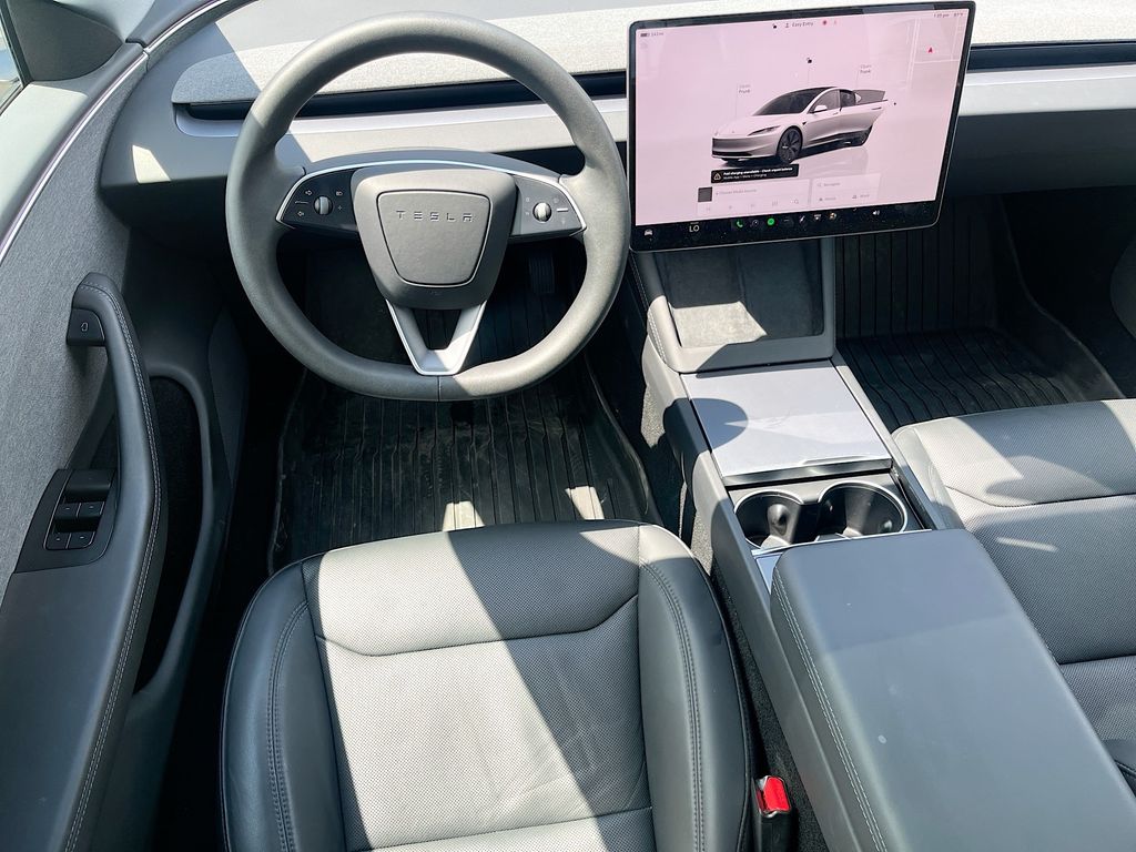 2025 Tesla Model 3 Long Range White at AutoSavvy Houston Northwest