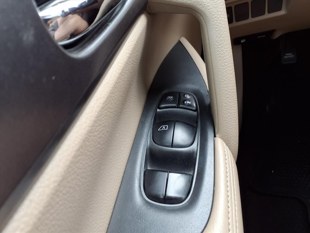 2016 Nissan Rogue SV Red at DeMontrond Gulf Freeway