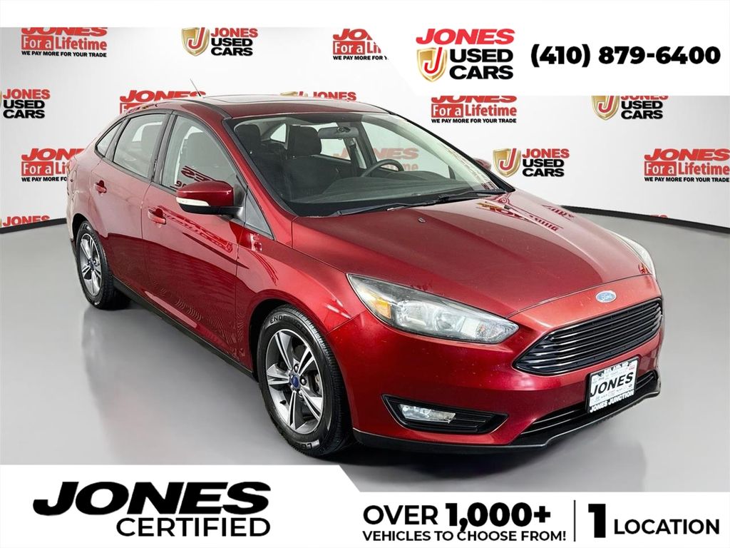Ruby Red Metallic 2016 Ford Focus Sedan Front-Wheel Drive Automatic