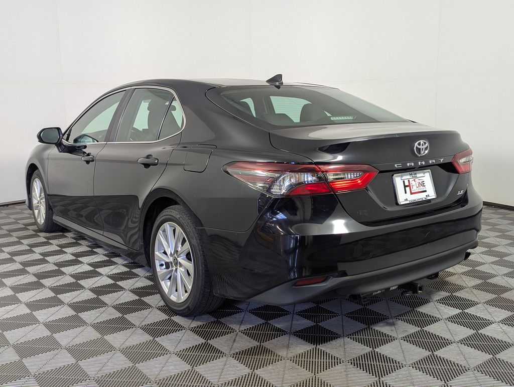 2024 Midnight Black Metallic Toyota Camry LE FWD Sedan