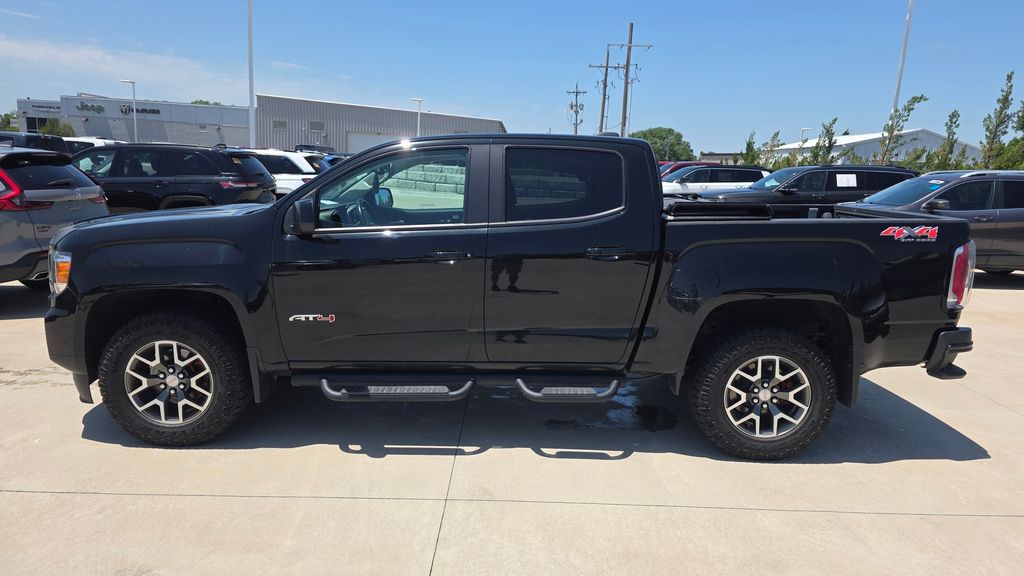 Used 2021 GMC Canyon AT4 with VIN 1GTG6FEN6M1243560 for sale in Kansas City
