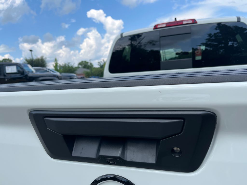 2026 Glacier White Nissan Frontier SV RWD Truck