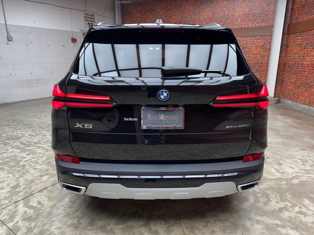 Used 2025 Black BMW xDrive50e image 4