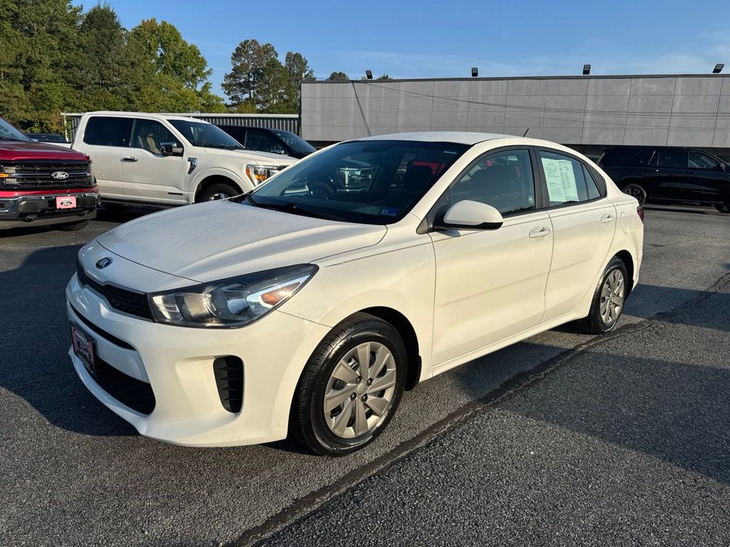 Clear White 2020 Kia Rio Sedan Front-Wheel Drive Continuously Variable Transmission