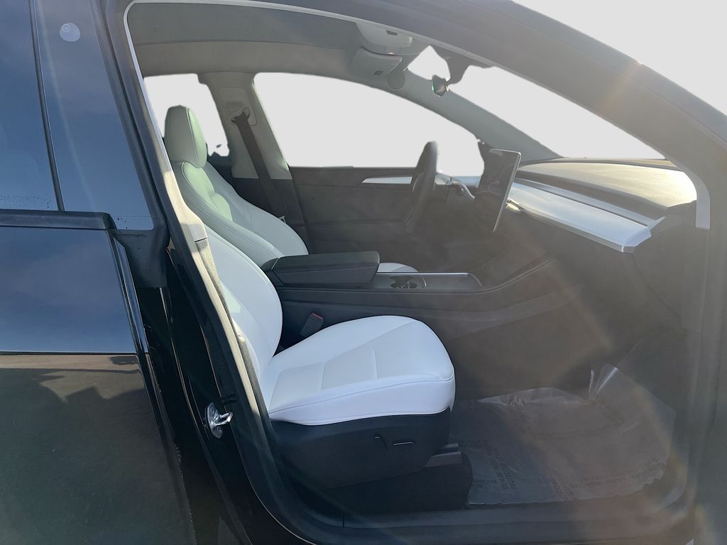 2025 Tesla Model Y Long Range Black at AutoSavvy Houston Northwest