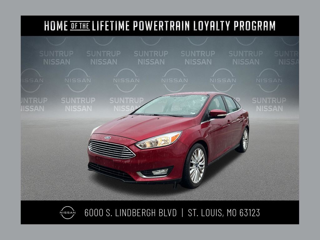 Ruby Red Metallic 2017 Ford Focus Titanium Sedan Front-Wheel Drive 6-Speed Automatic