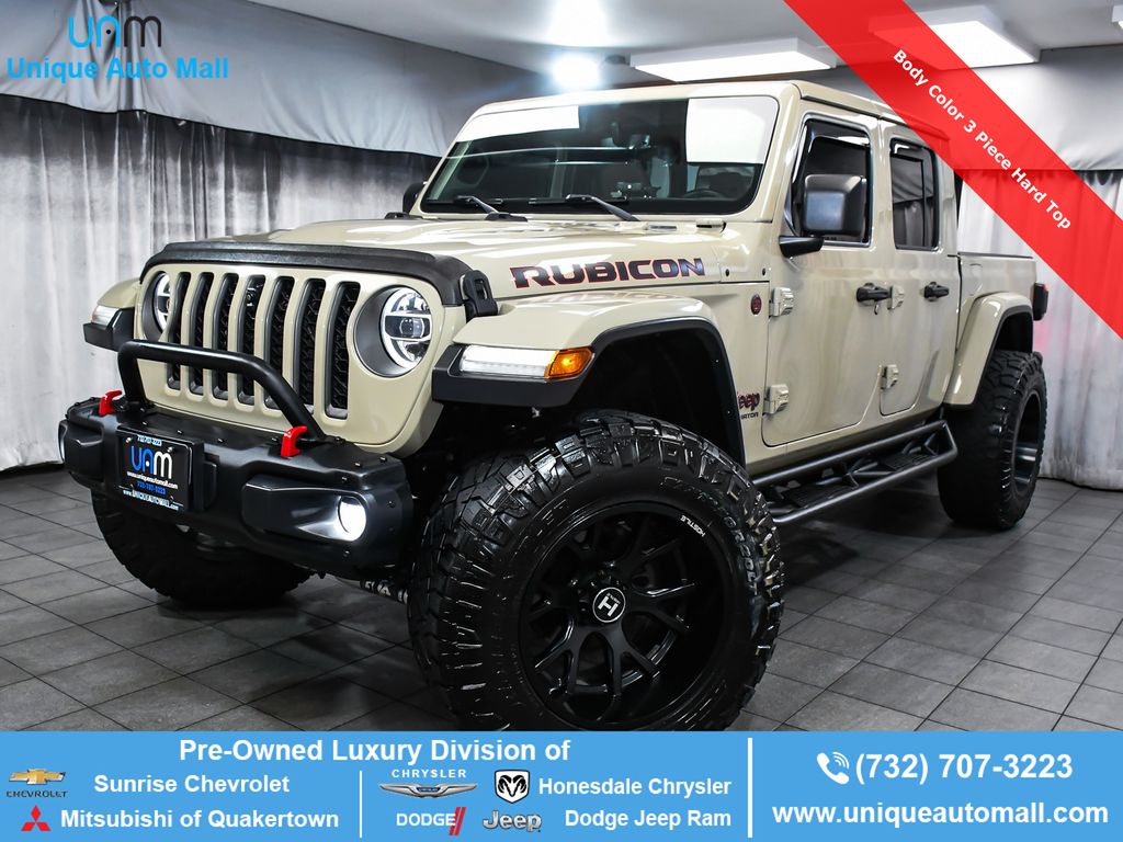 Brown (Gobi Clearcoat) 2020 Jeep Gladiator Pickup Truck Four-Wheel Drive 6-Speed Manual