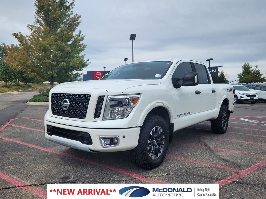 Pearl White Metallic 2018 Nissan Titan Pickup Truck Four-Wheel Drive 7-Speed Automatic