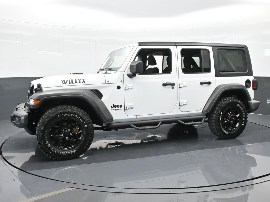 Certified 2021 Jeep Wrangler Unlimited Willys with VIN 1C4HJXDN0MW552633 for sale in Miami, FL