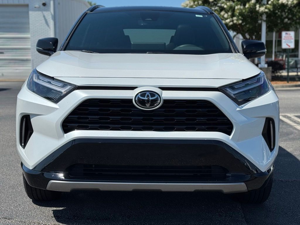 2025 Toyota RAV4 Hybrid XSE Wind Chill Pearl/Midnight Black Metallic - Jim Hudson Acura - Image 4
