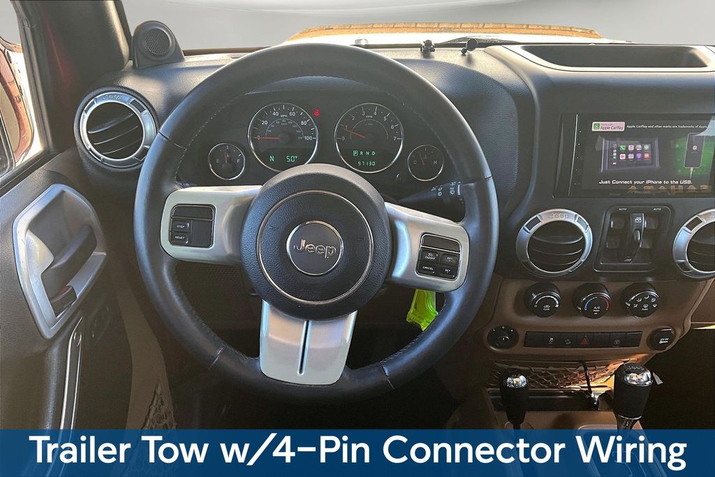 Used 2013 Red Jeep Unlimited Sahara image 9