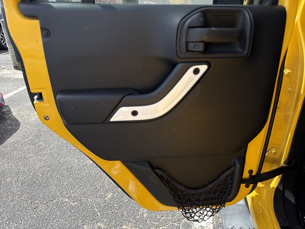 2015 Jeep Wrangler Unlimited Sahara Yellow at Parkway Family Mazda