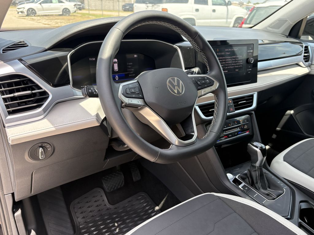 2025 Volkswagen Taos 1.5T SE Black at DeMontrond Automotive Group