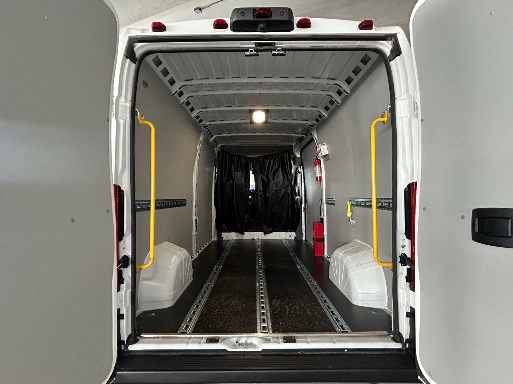 Used 2025 Bright White Clearcoat Ram High Roof image 28