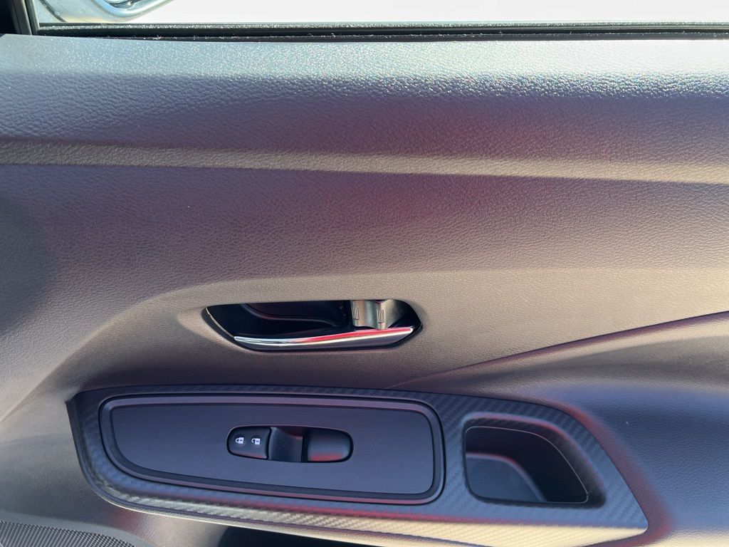 2025 Gray Sky Pearl Nissan Versa 1.6 SV FWD Sedan