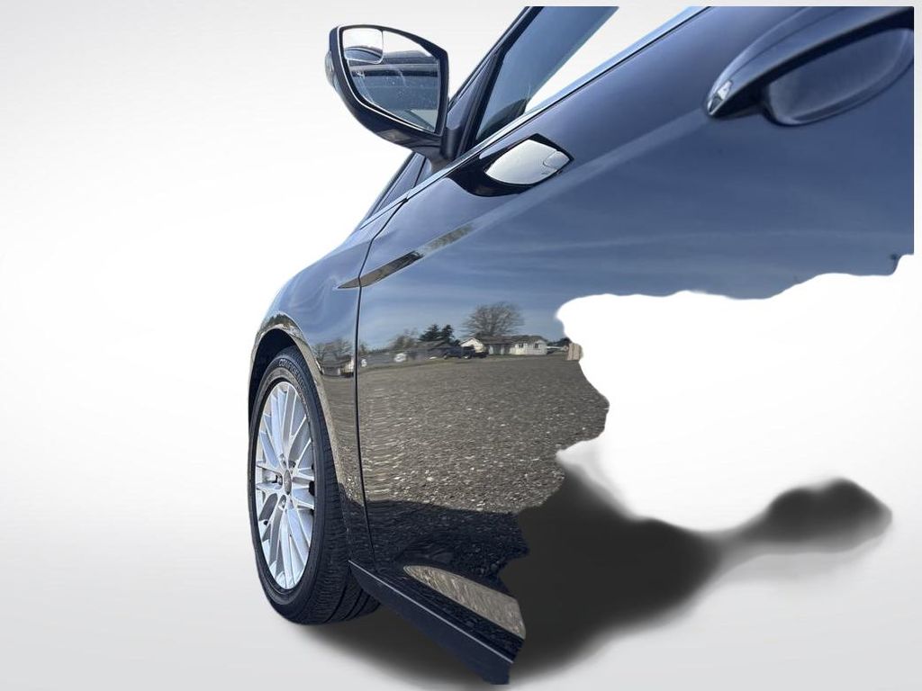 2014 Tuxedo Black Metallic Ford Focus Titanium FWD Hatchback