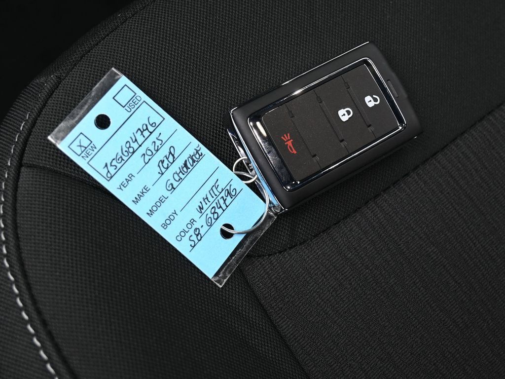 Used 2025 Bright White Clearcoat Jeep Laredo image 9