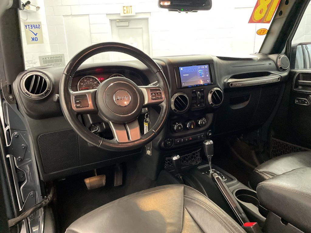 Used 2018 Black Jeep Unlimited Sahara image 12