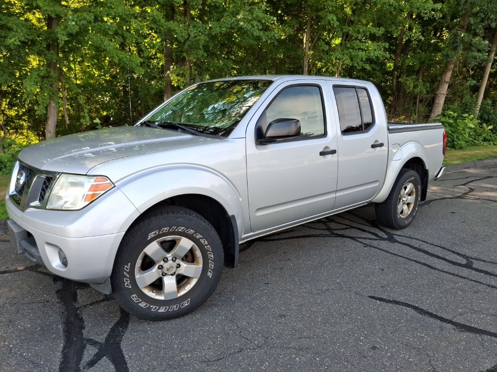 Brilliant Silver 2012 Nissan Frontier Pickup Truck Four-Wheel Drive 5-Speed Automatic Overdrive