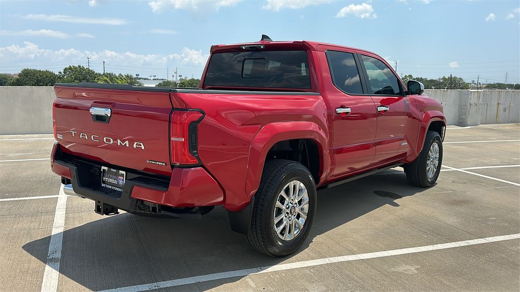 2026 Toyota Tacoma Hybrid Limited Red at EAG Ford Navasota