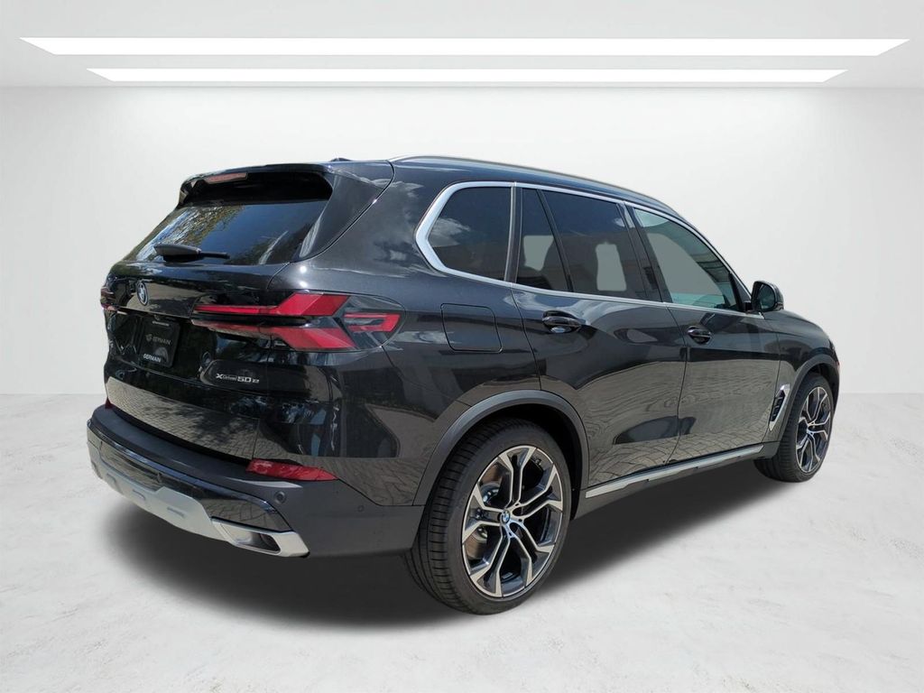 New 2026 Black BMW xDrive50e image 4