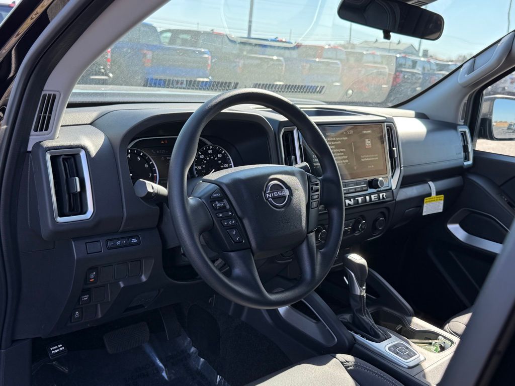 View vehicle photo 3
