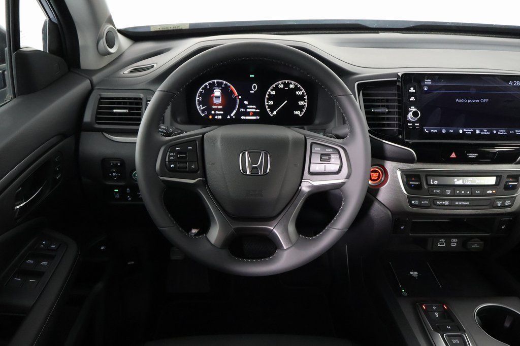 View vehicle photo 3