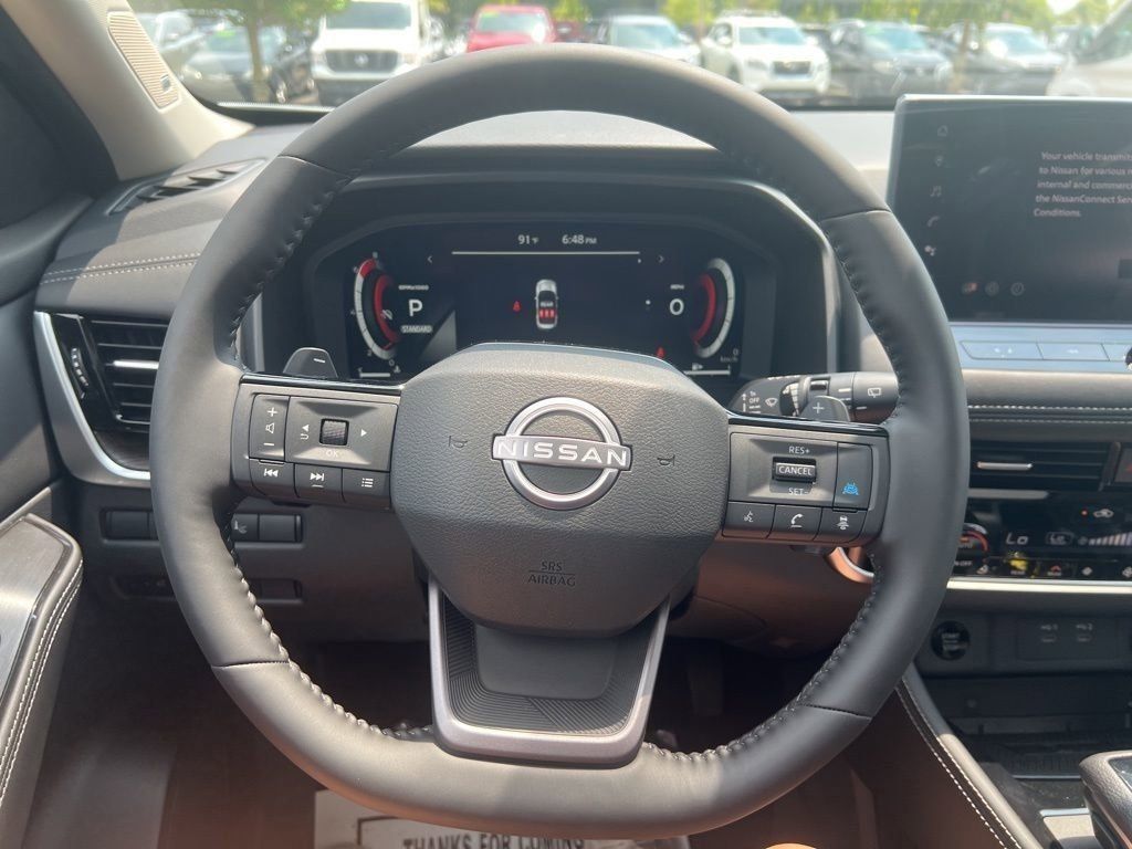2025 Everest White Pearl/Super Black Nissan Rogue Platinum FWD SUV