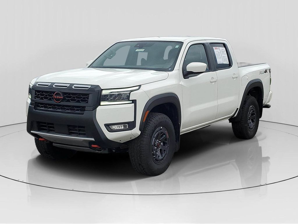 Glacier White 2025 Nissan Frontier Pickup Truck Four-Wheel Drive 9-Speed Automatic Overdrive