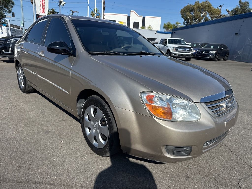 Gold 2007 Kia Spectra EX Sedan Front-Wheel Drive 4-Speed Automatic Overdrive