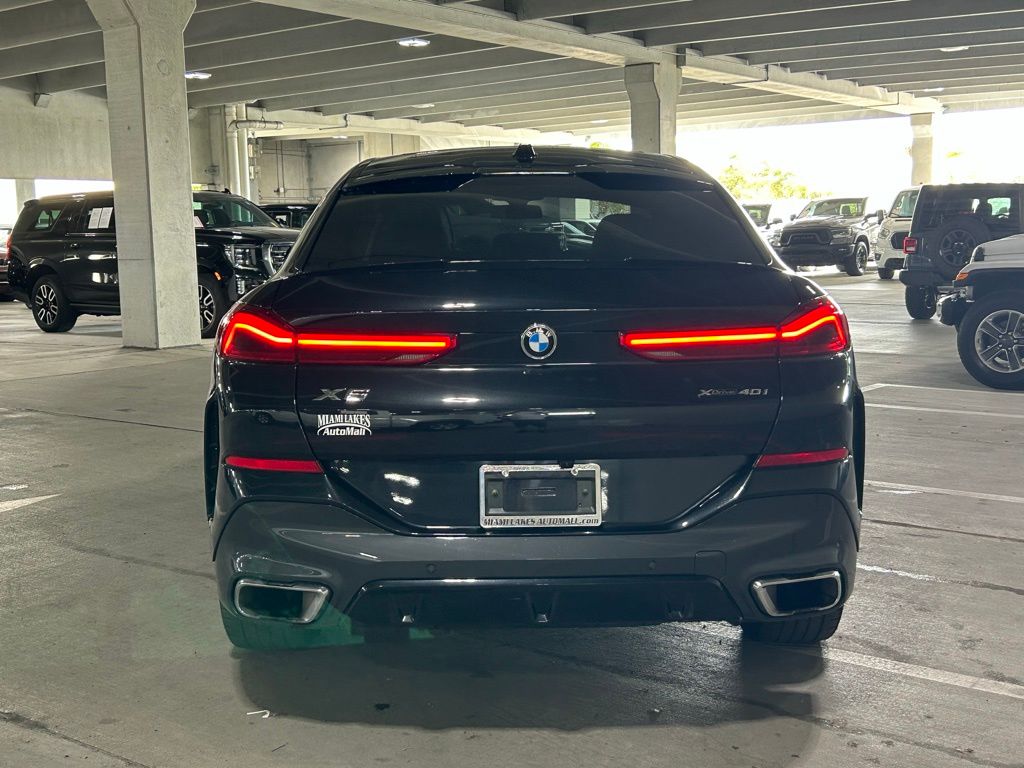 Used 2024 Black Sapphire Metallic BMW xDrive40i image 4