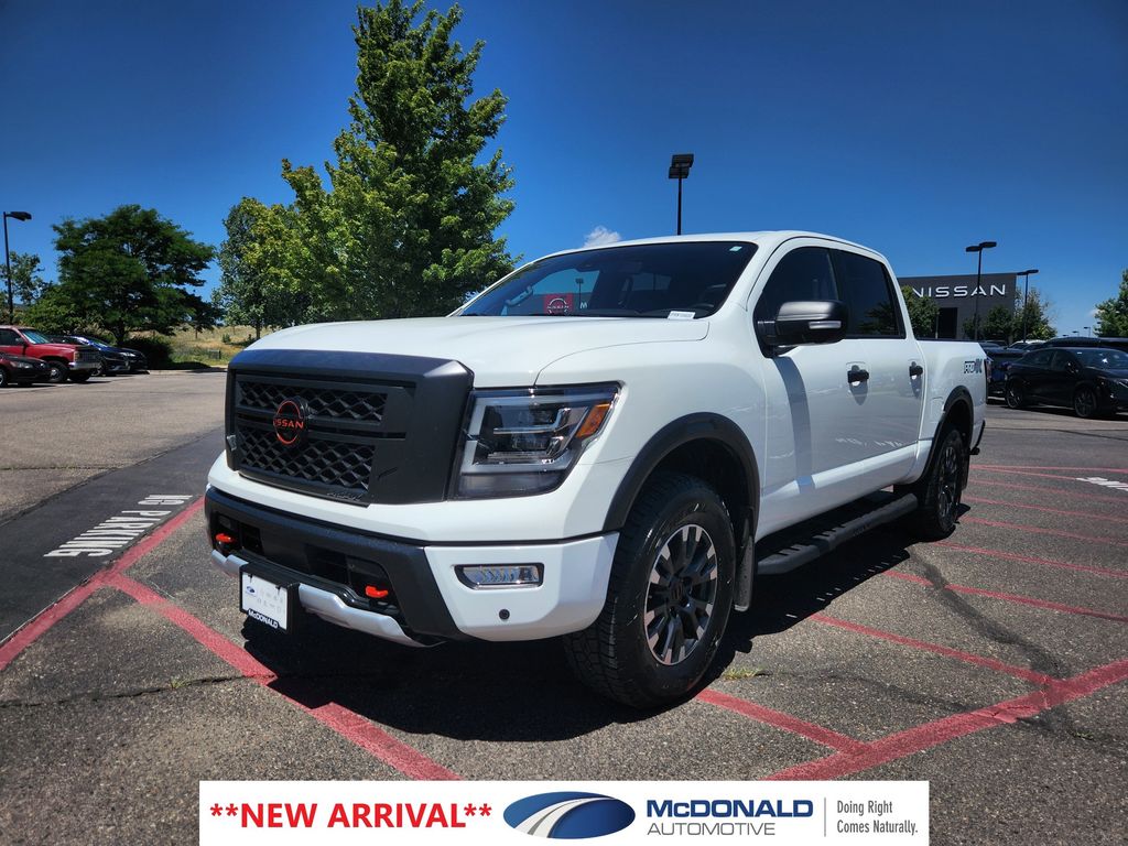 Glacier White 2024 Nissan Titan Pickup Truck Four-Wheel Drive 9-Speed Automatic
