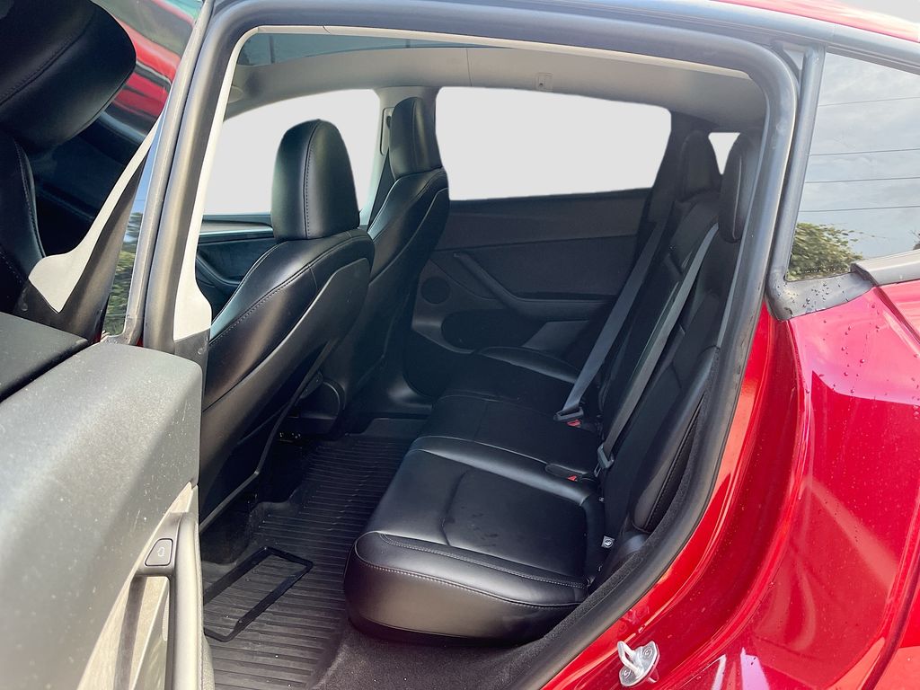 2025 Tesla Model Y Long Range Red at AutoSavvy Houston Northwest