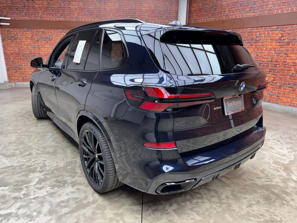 Certified Used 2024 Black BMW xDrive40i image 2