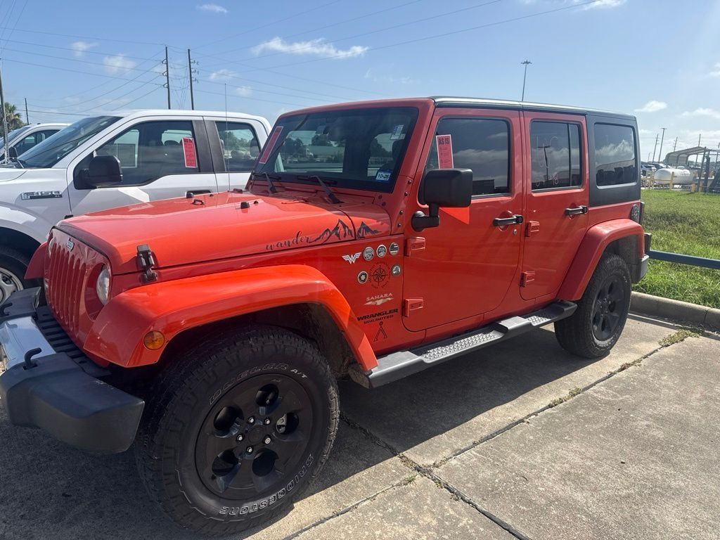2015 Jeep Wrangler Unlimited Sahara Orange at Emmons Autoplex