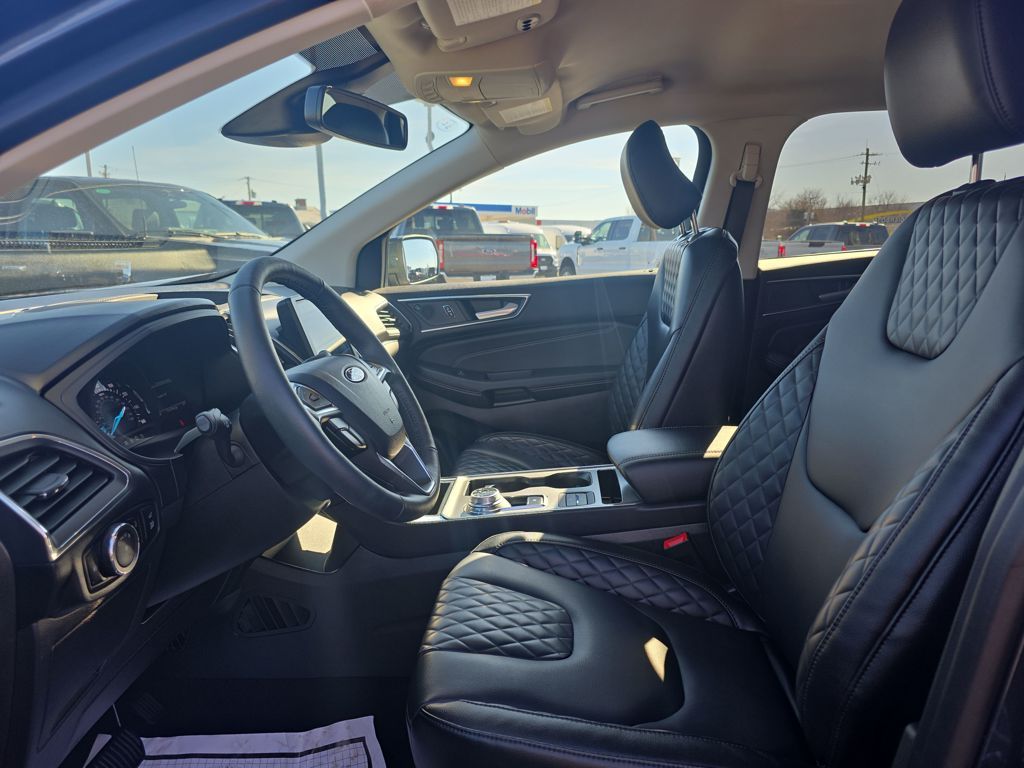 Certified Used 2024 Blue Ford Titanium image 16