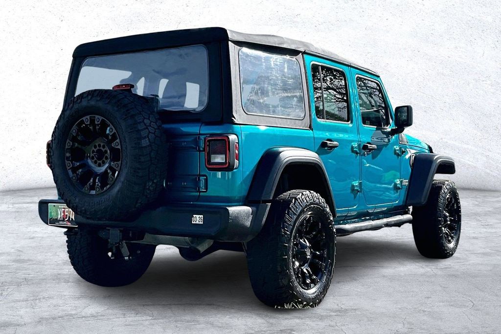 Used 2020 Teal Jeep Unlimited Sport image 2