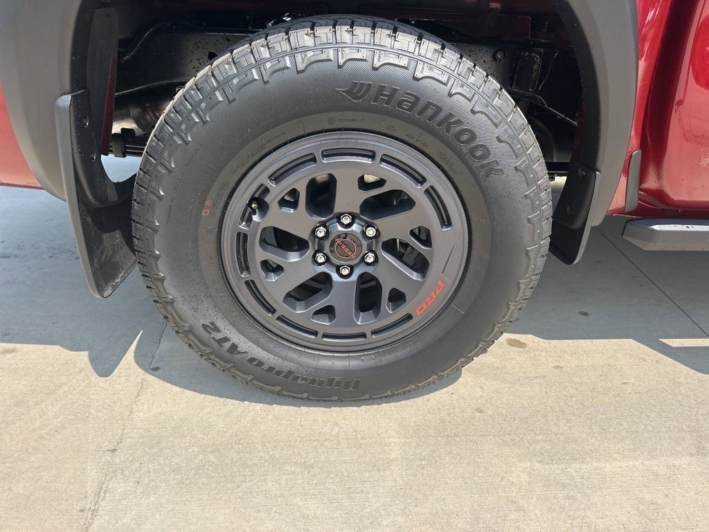 2025 Cardinal Red Metallic Tricoat Nissan Frontier PRO-4X 4X4 Truck
