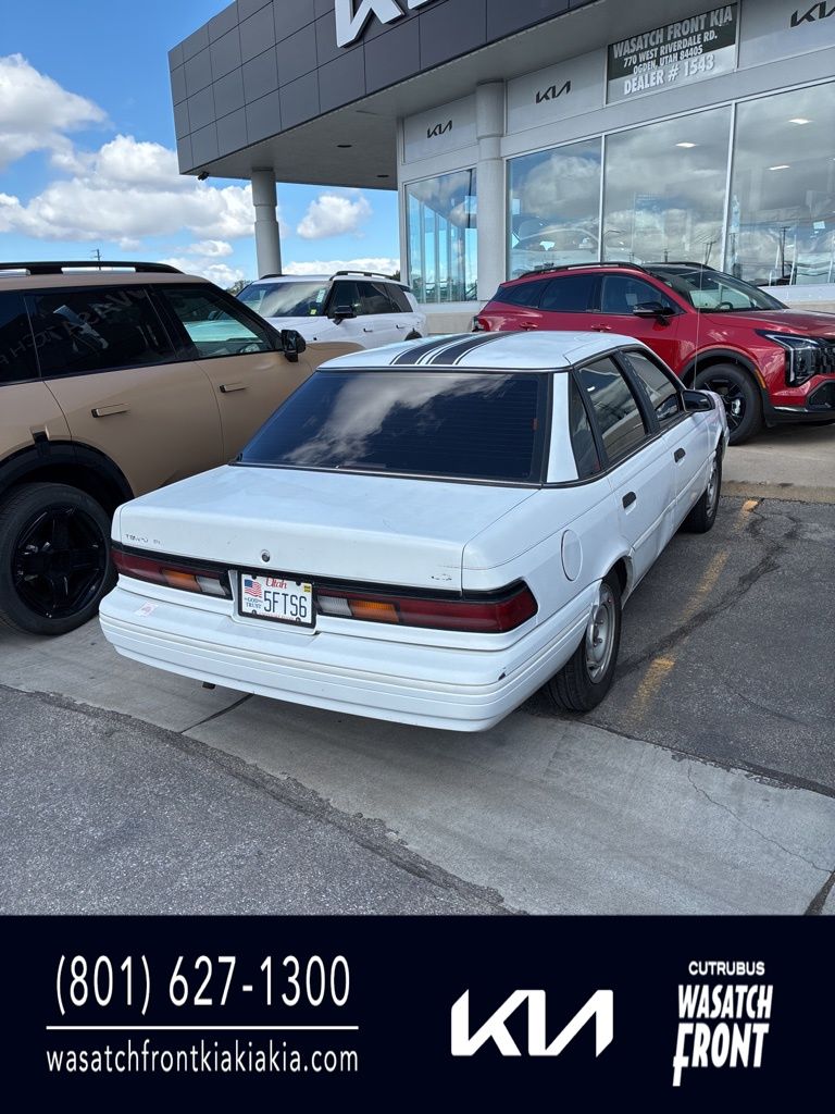White 1992 Ford Tempo 4 Dr GL Sedan Sedan Front-Wheel Drive