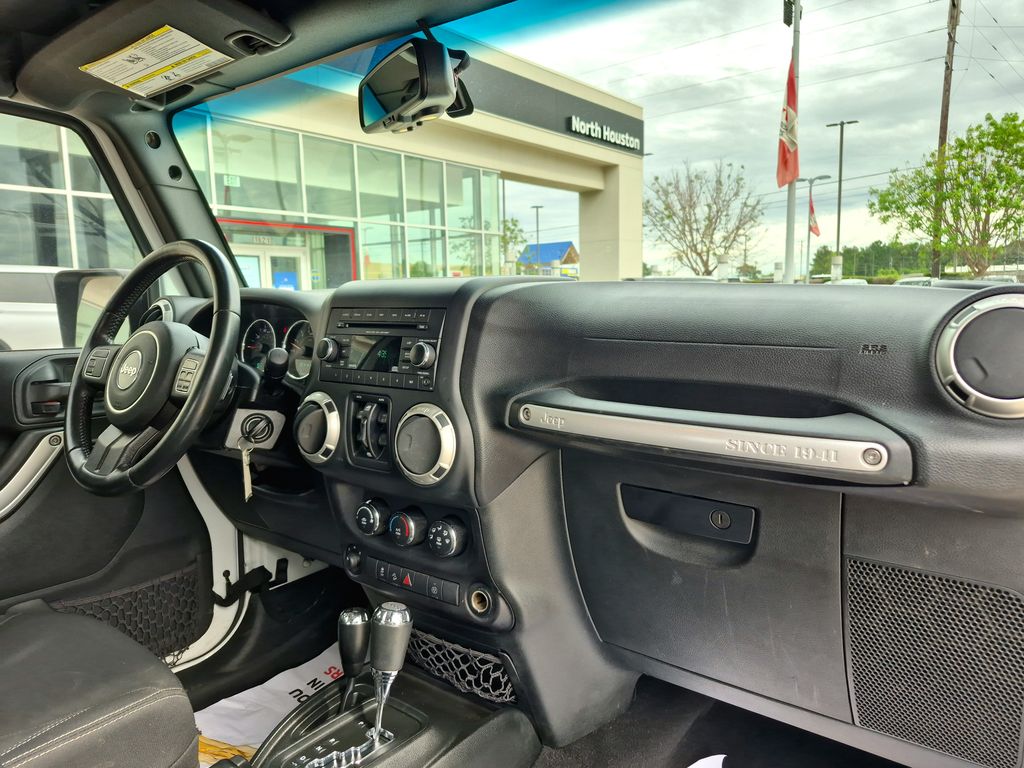 2018 Jeep Wrangler JK Unlimited Sahara White at Gullo Toyota