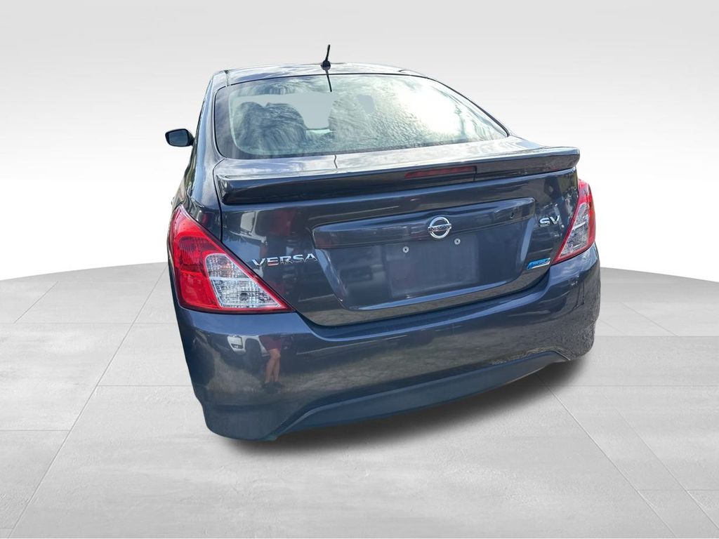 2015 Amethyst Gray Nissan Versa 1.6 SV FWD Sedan