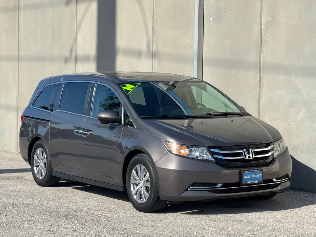 Used 2014 Honda Odyssey EX-L with VIN 5FNRL5H6XEB080145 for sale in Lee's Summit, MO
