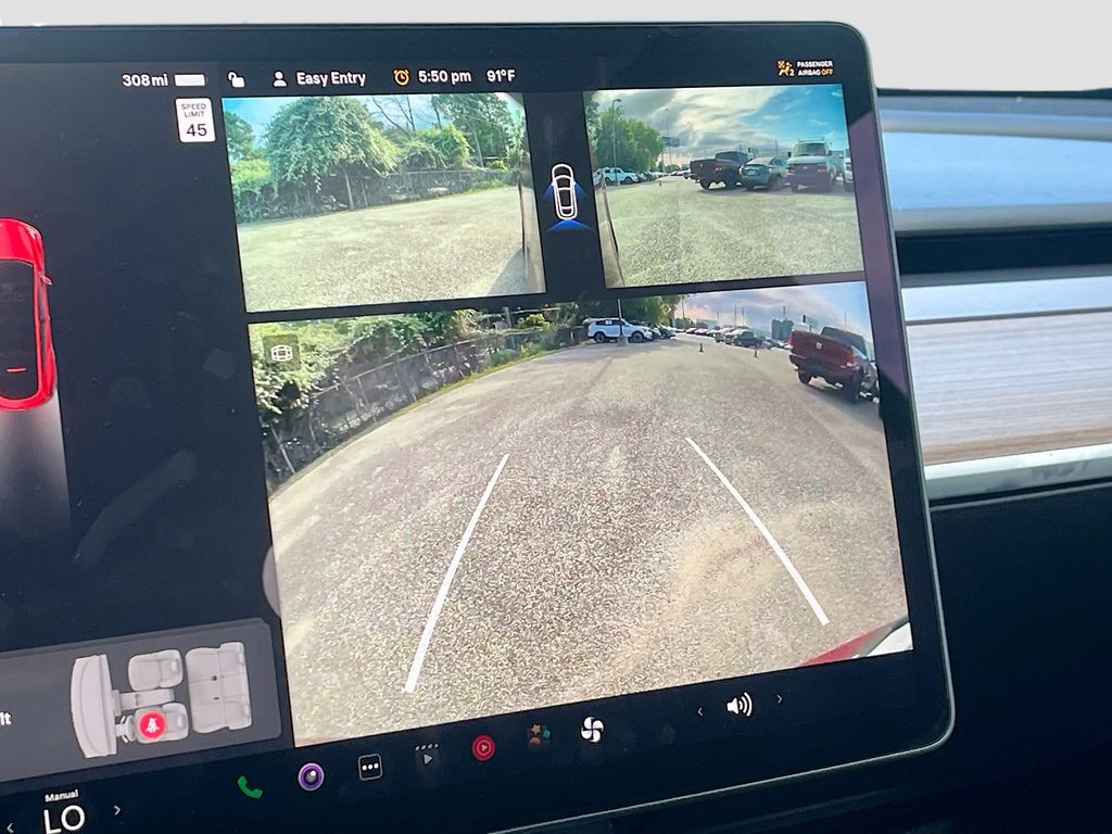 2025 Tesla Model Y Long Range Red at AutoSavvy Houston Northwest